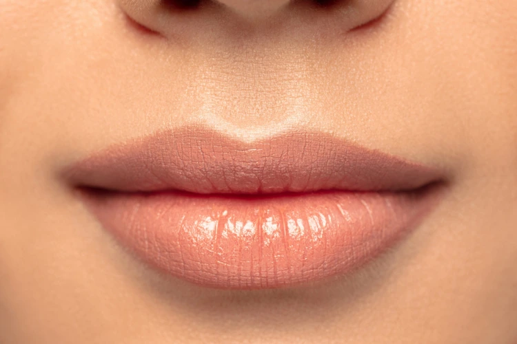 Close up view of a lady with beautiful and balanced lips.