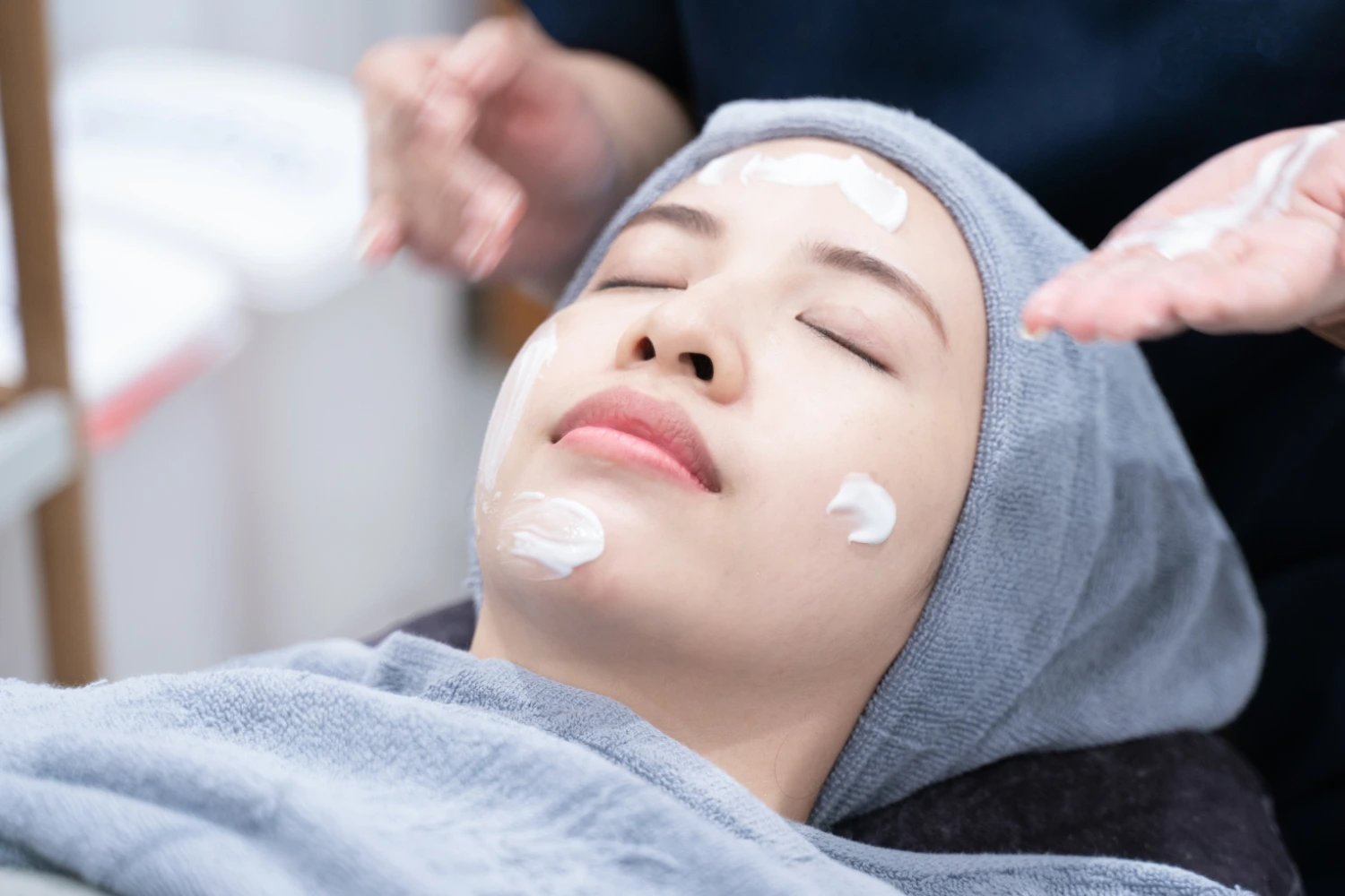 Lady undergoing Acne/Acne Scar treatment at clinic.