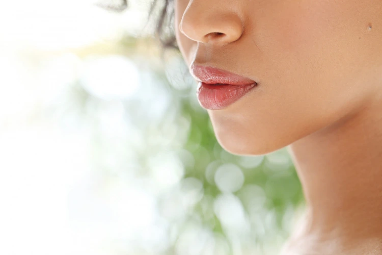 Close up view of a lady with a nice and full looking chin from fillers.