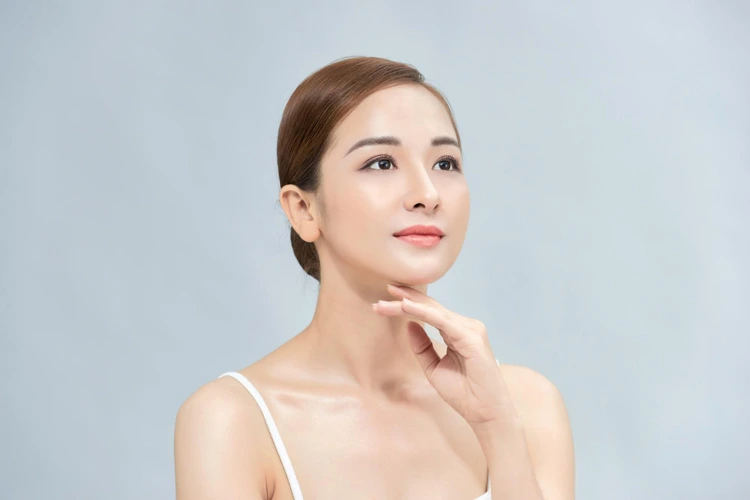 Lady with flawless facial complexion after HIFU treatment.